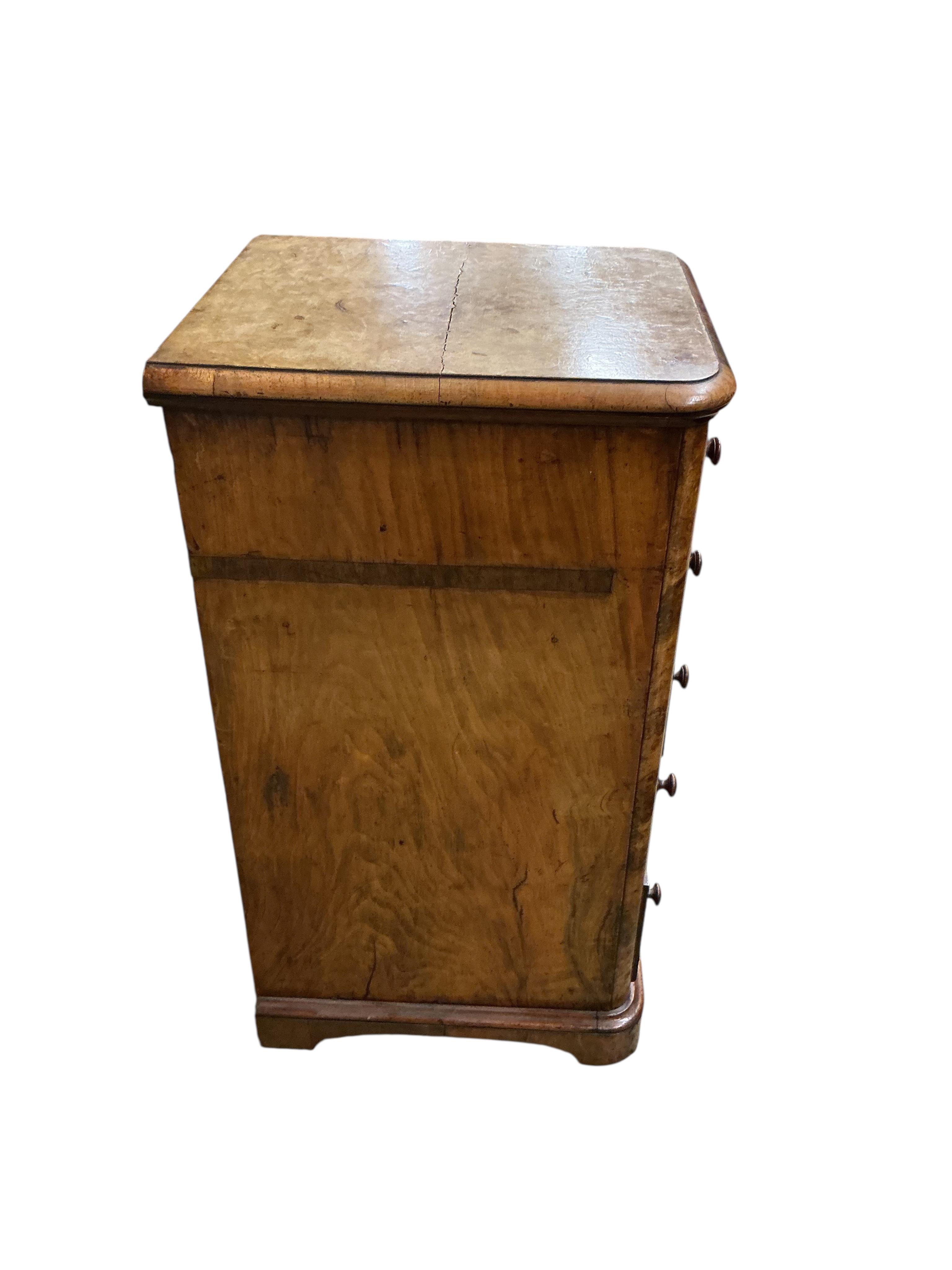 A pair of Victorian figured walnut five drawer bedside chests, adapted from a dressing table, width 43cm, depth 47cm, height 86cm